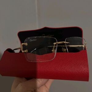 Cartier Black and Gold Rimless Glasses with Red Case